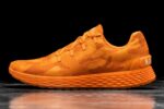 ノブルウィメンズリップストップランナーネオンオレンジカモ
