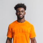 Nobull メンズ Tシャツ (ネオンカモ) オレンジ